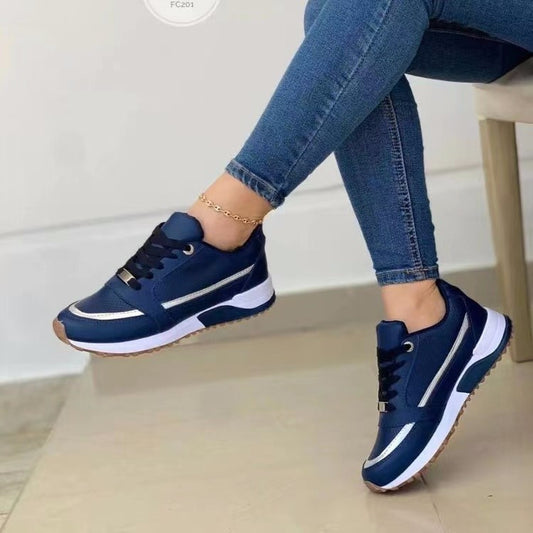 Women's low top sneakers with round toe